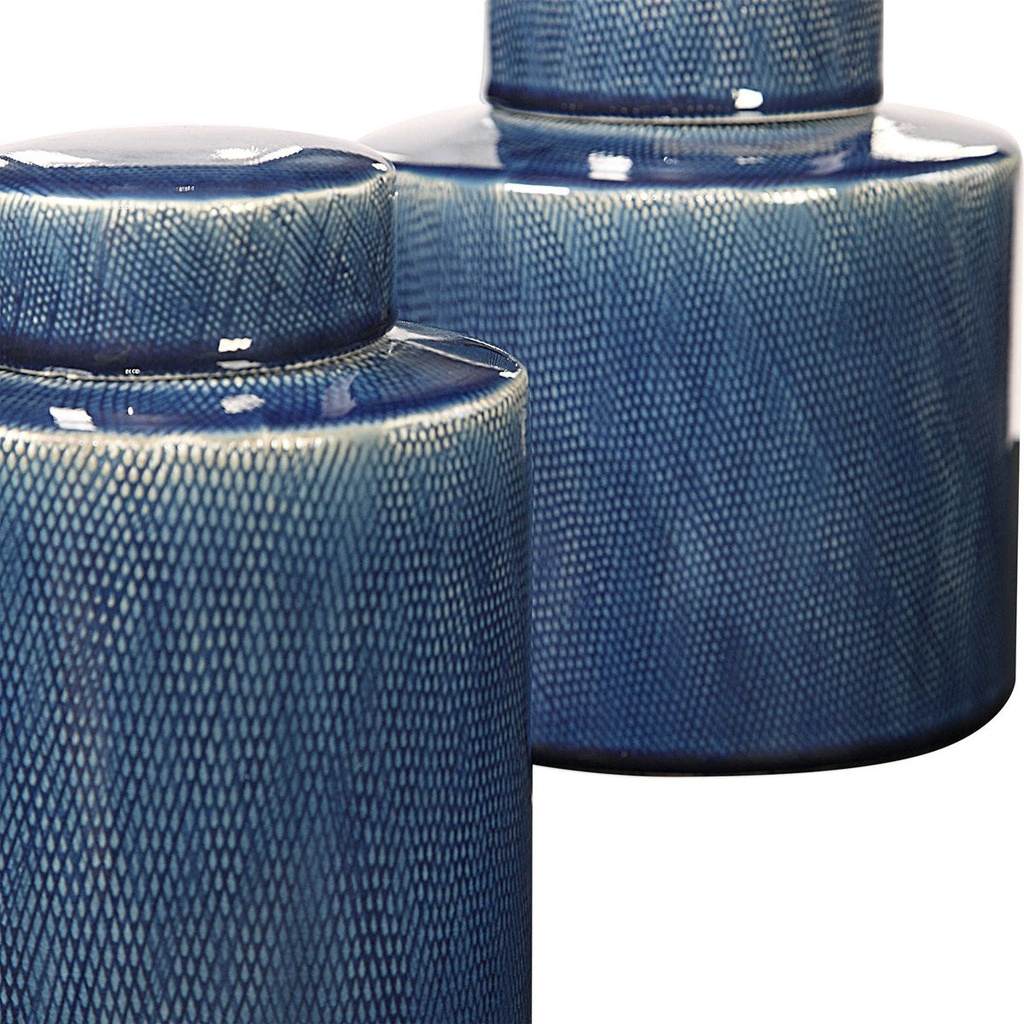Close-Up View. This set of two, sapphire blue ceramic containers feature a geometric pattern with iv