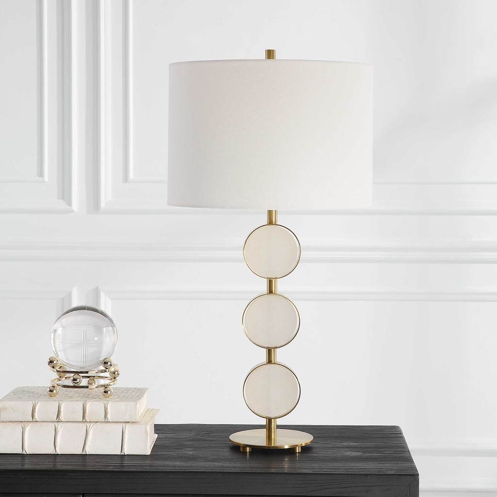 Decorative View. This table lamp brings a soft contemporary flair to any room by featuring three sus