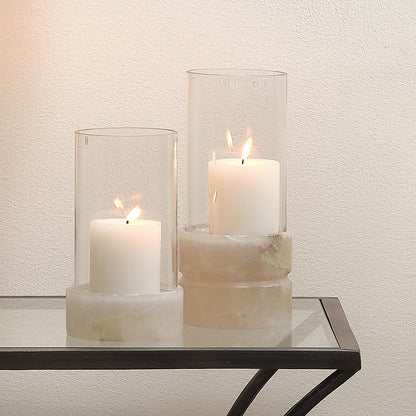 Decorative View. Set atop a hand-carved alabaster base, our artisan made candle holder displays a st