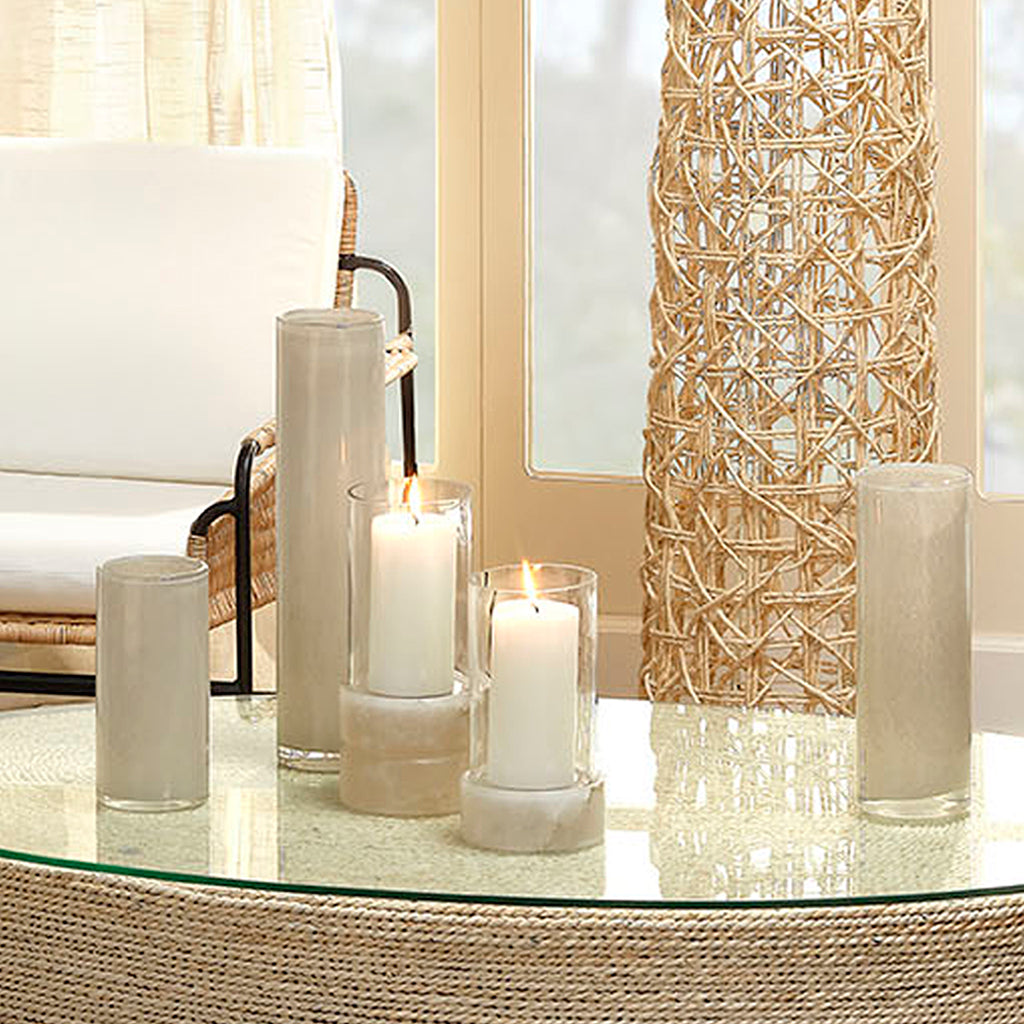 Decorative View. Set atop a hand-carved alabaster base, our artisan made candle holder displays a st