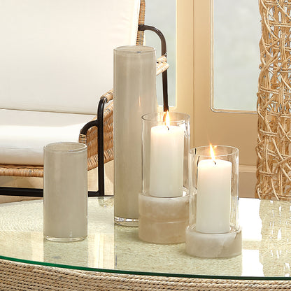 Decorative View. Set atop a hand-carved alabaster base, our artisan made candle holder displays a st