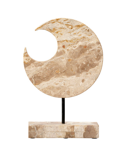 Front View. This dramatic sculpture uses cream colored marble to reflect and respect the beauty of c