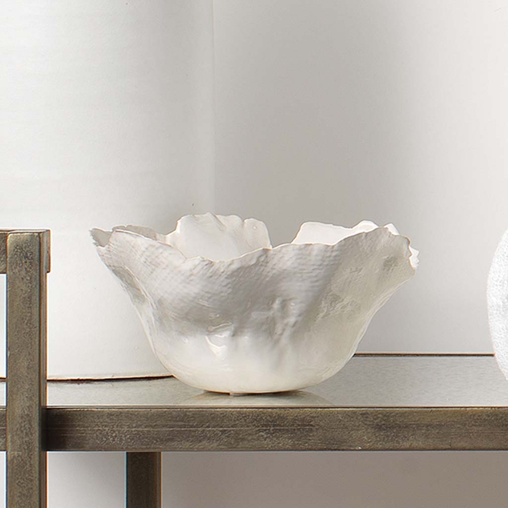 Decorative View. These delicate catchall bowls have graceful organic edges that are perfectly imperf