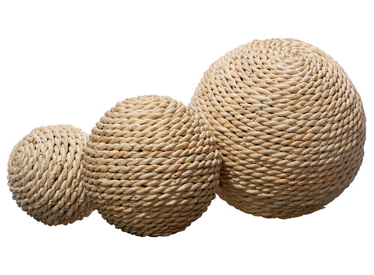 Front View. Hand-made out of natural wood and wrapped in rattan, this set of decorative balls are pe