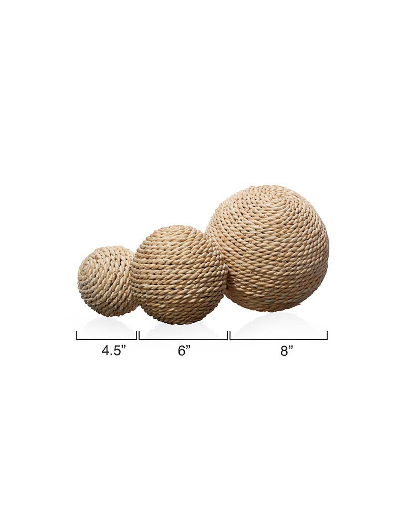 Measurement View. Hand-made out of natural wood and wrapped in rattan, this set of decorative balls