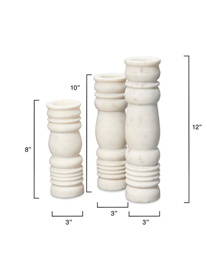 Measurement View. Beautifully artisan-carved of cool white stone, this set of three candlesticks pai