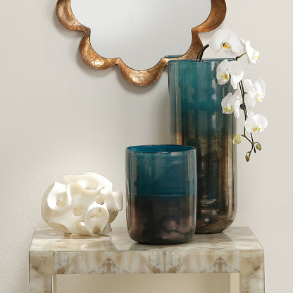 Decorative View. This whimsical resin sphere is reminiscent of ocean coral, and its undulating ribbo