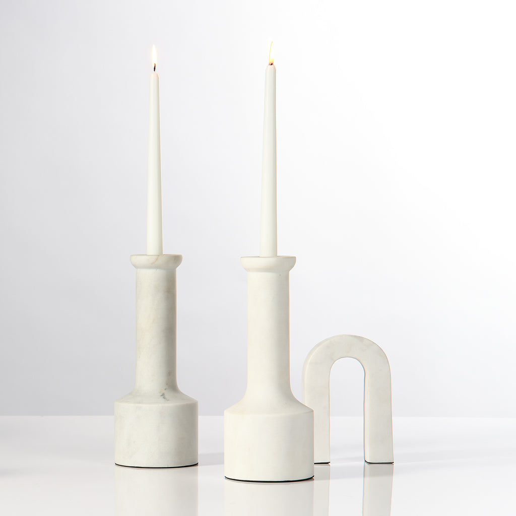 Decorative View. Beautifully artisan-carved of clean, crisp white marble, this set of two candlestic