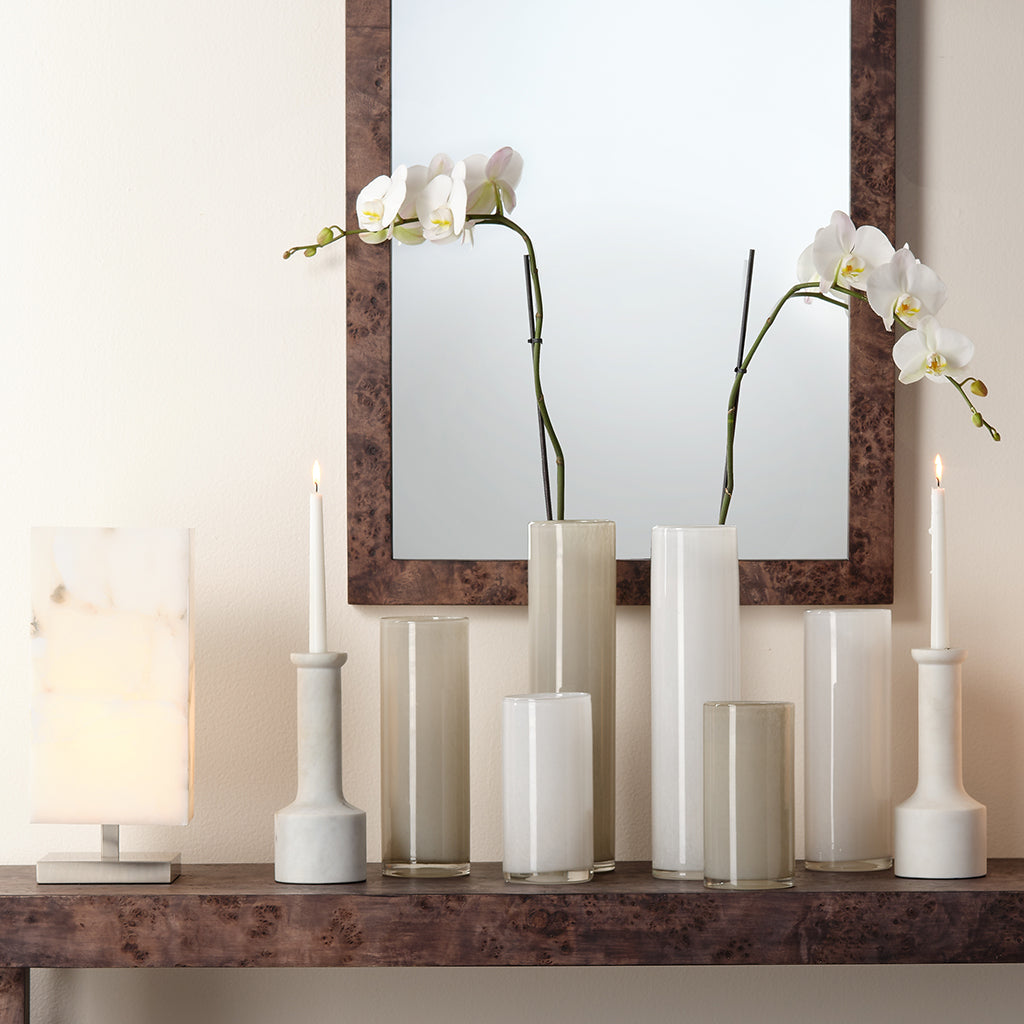 Decorative View. Beautifully artisan-carved of clean, crisp white marble, this set of two candlestic