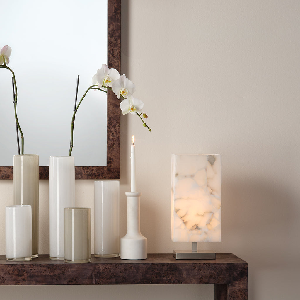 Decorative View. Beautifully artisan-carved of clean, crisp white marble, this set of two candlestic