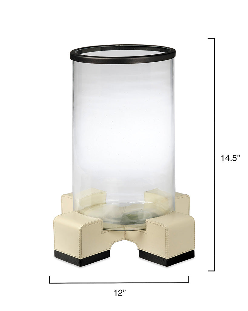 Measurement View. Edgy, elemental materials balance the softness of a candle’s glow in this contempo