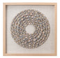 Front View. An assortment of natural screw shells are arranged into shrinking concentric circles tha