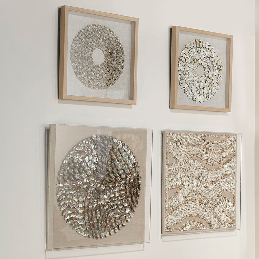 Decorative View. An assortment of natural abalone shells are arranged into shrinking concentric circ