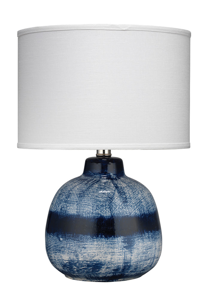 Front View. Inspired by Japanese ceramics, this lamp is a stunning ceramic accent that features a de