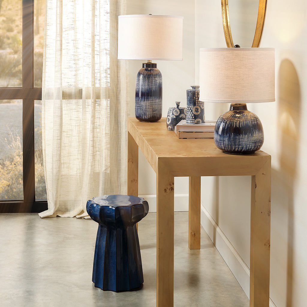 Decorative View. Inspired by Japanese ceramics, this lamp is a stunning ceramic accent that features