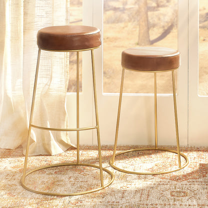 Decorative View. These unique stools feature a comfortably padded round seat in top-quality leather