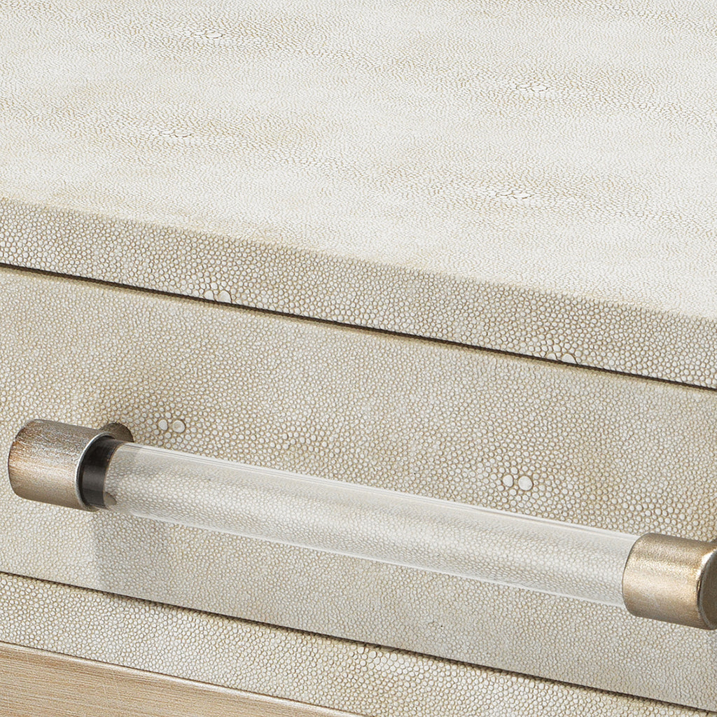 Close-Up View. Add a designer-worthy touch to your space with this side table. Resting on an airy ch