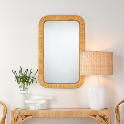 Decorative View. Placed at the end of a hallway or in an alcove, this mirror opens up its surroundin