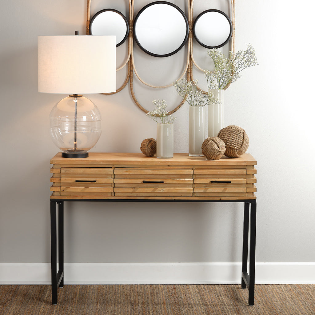 Decorative View. Industrial modern loft style slatted wood console table with black metal base has a