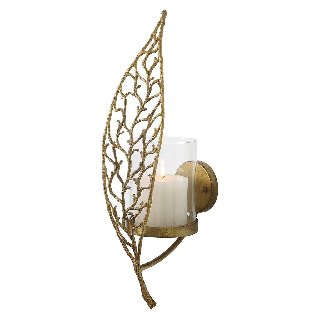 Angle View. Echoing the intricate details of natural flora, this candle sconce is crafted from solid