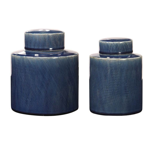 Front View. This set of two, sapphire blue ceramic containers feature a geometric pattern with ivory