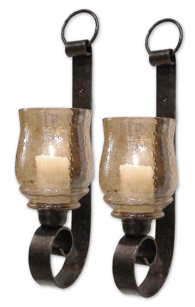 Angle View. These decorative candleholders feature an antiqued bronze metal base with transparent am