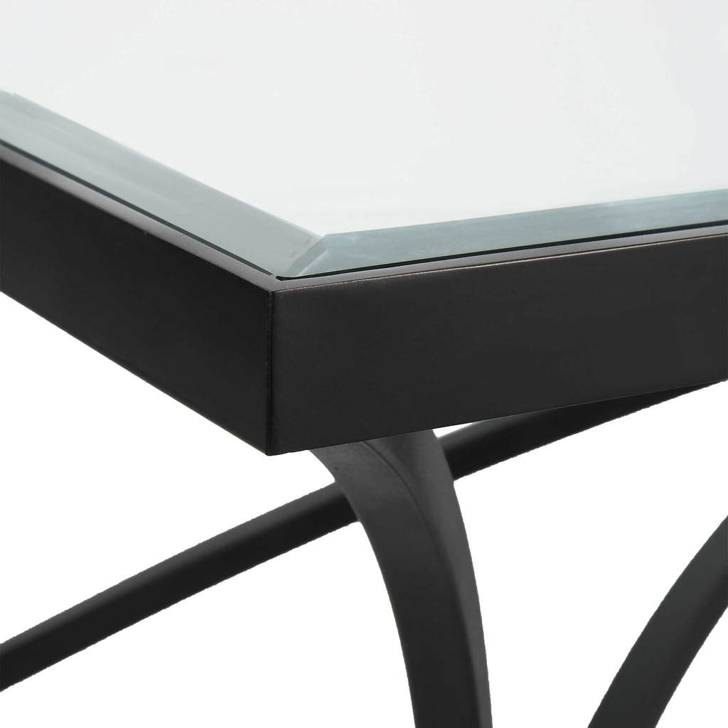 Close-Up View. The Alayna Coffee Table features gracefully arched hand forged metal that is finished