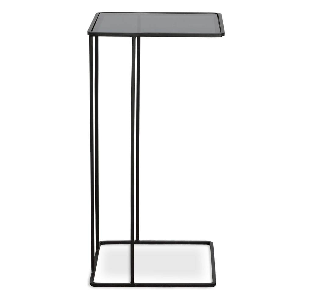 Angle View. Minimally designed with versatility, this petite hand forged iron accent table is finish