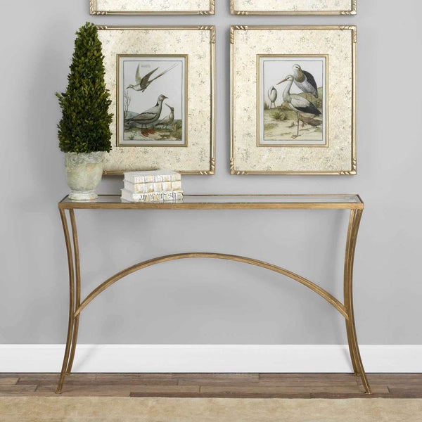 Decorative View. The Alayna Console Table features gracefully arched hand forged iron that is finish