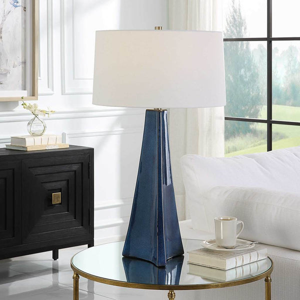 Decorative View. The Teramo Table Lamp features a tapered ceramic base with softly scalloped sides f