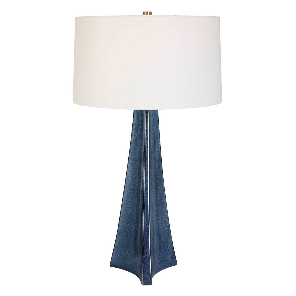 Front View. The Teramo Table Lamp features a tapered ceramic base with softly scalloped sides finish