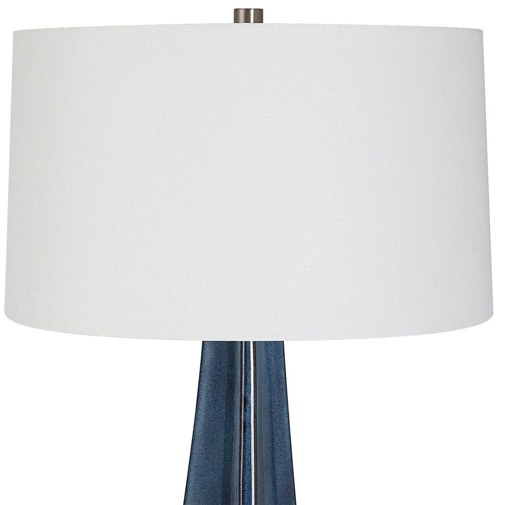 Close-Up View. The Teramo Table Lamp features a tapered ceramic base with softly scalloped sides fin