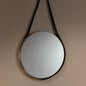 Large Round Mirror in Antique Brass & Black Leather Strap Jamie Young Aura of Distinction