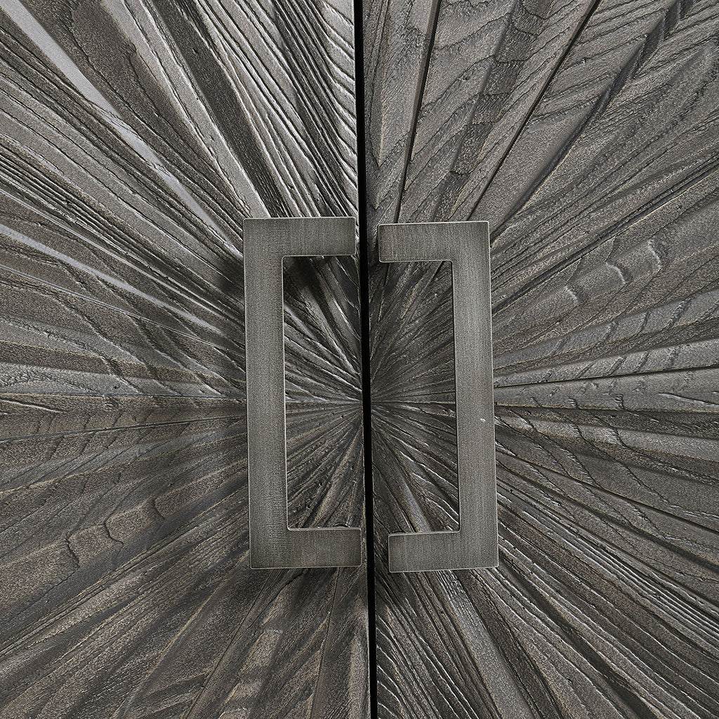 Close-Up View. Inspired by global bohemian style, the Shield gray two door cabinet features a striki