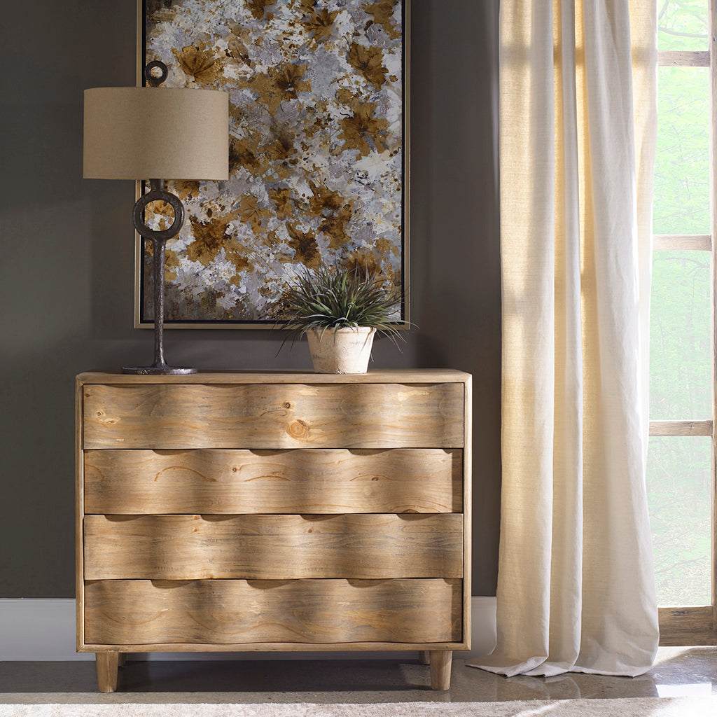 Decorative View. The Crawford Light Oak Accent Chest is Mid-century modern inspired with an updated 